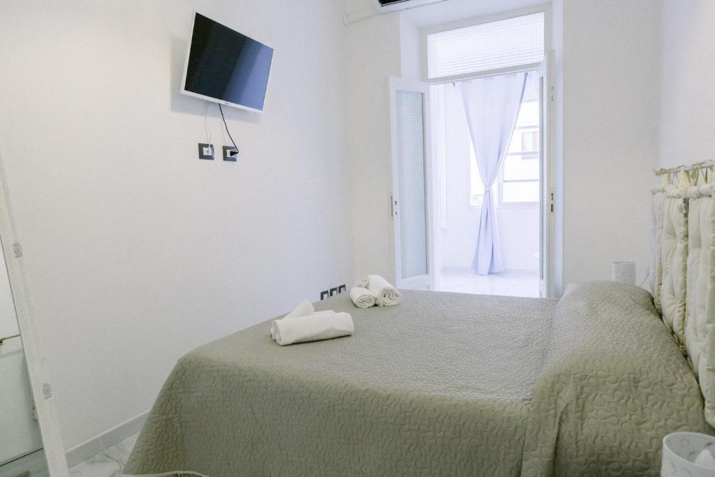 Postel nebo postele na pokoji v ubytování FG Vacanze