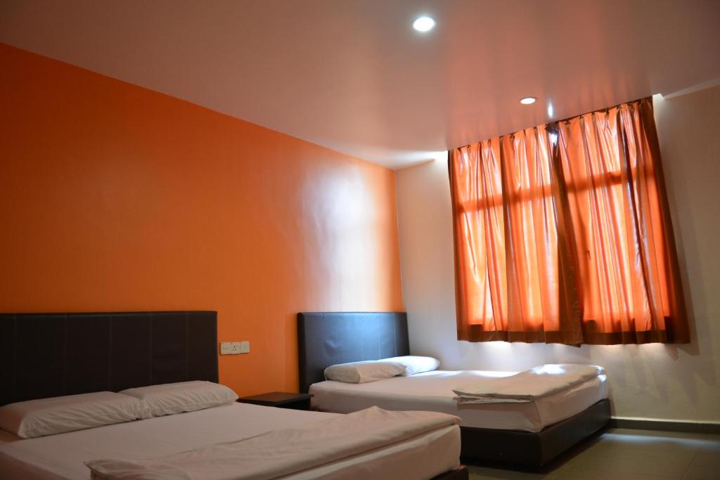 Postel nebo postele na pokoji v ubytování GF WONDERFUL HOTEL
