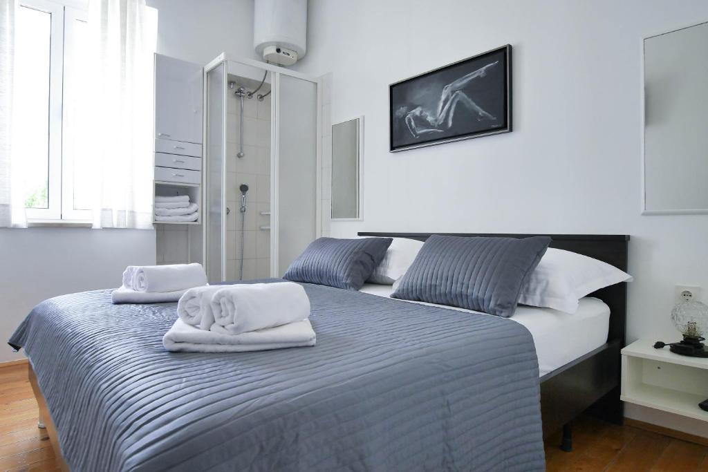 Posteľ alebo postele v izbe v ubytovaní Apartment Beach Makarska