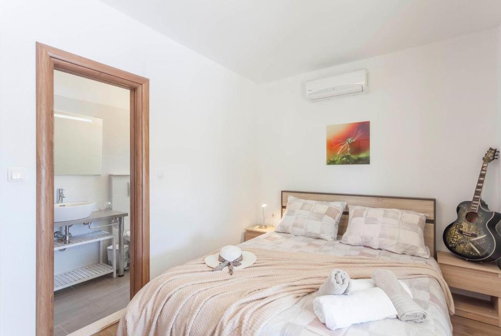 Posteľ alebo postele v izbe v ubytovaní Villa Cupido in Makarska, private pool