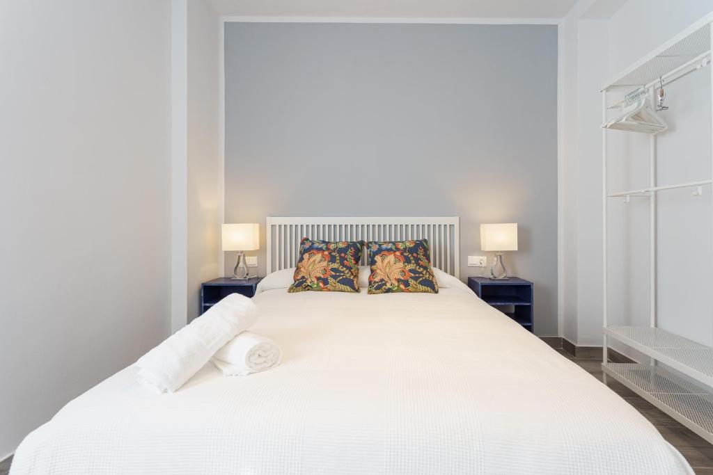 Posteľ alebo postele v izbe v ubytovaní CASANA APARTAMENT CITY CENTER