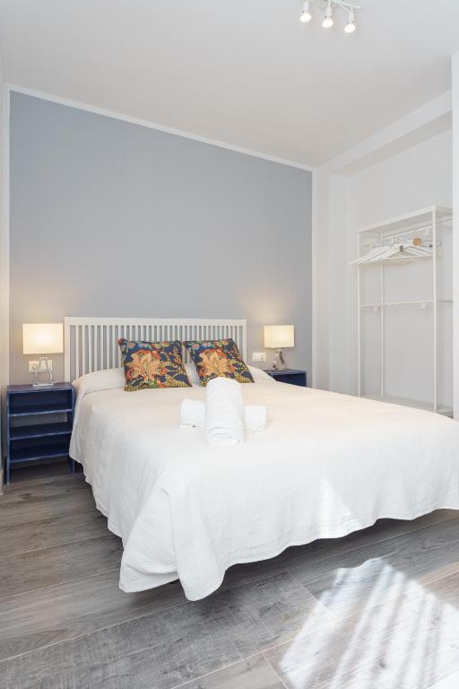 Posteľ alebo postele v izbe v ubytovaní CASANA APARTAMENT CITY CENTER