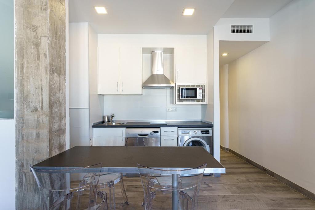 Kuchyňa alebo kuchynka v ubytovaní CASANA APARTAMENT CITY CENTER