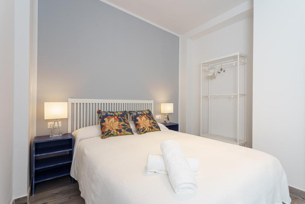 Posteľ alebo postele v izbe v ubytovaní CASANA APARTAMENT CITY CENTER