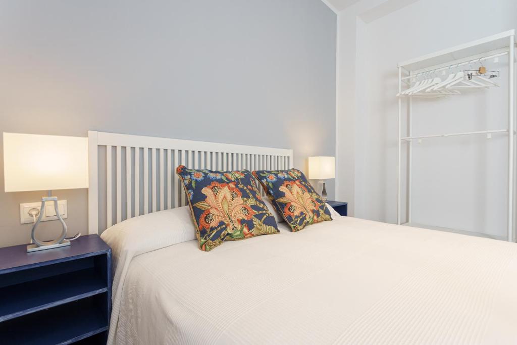 Posteľ alebo postele v izbe v ubytovaní CASANA APARTAMENT CITY CENTER