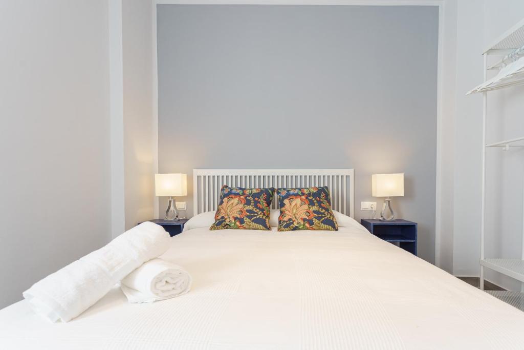 Posteľ alebo postele v izbe v ubytovaní CASANA APARTAMENT CITY CENTER