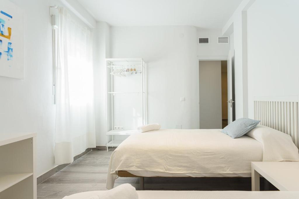 Posteľ alebo postele v izbe v ubytovaní CASANA APARTAMENT CITY CENTER