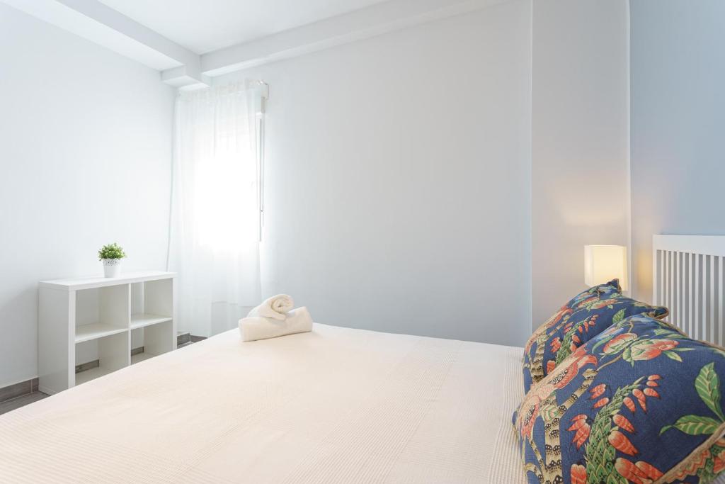 Posteľ alebo postele v izbe v ubytovaní CASANA APARTAMENT CITY CENTER