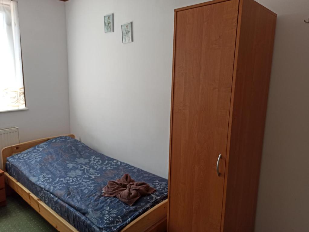 Postel nebo postele na pokoji v ubytování Gościniec Silver