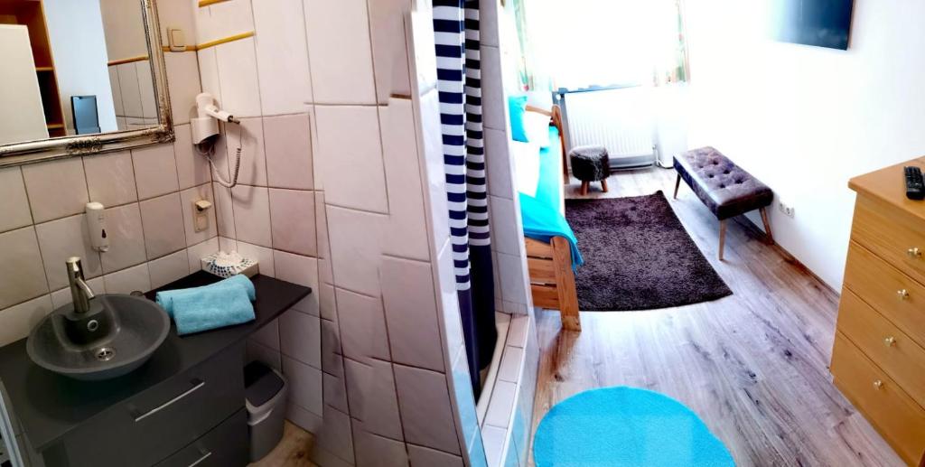 Koupelna v ubytování Hotel Apartment Das Au- Gut