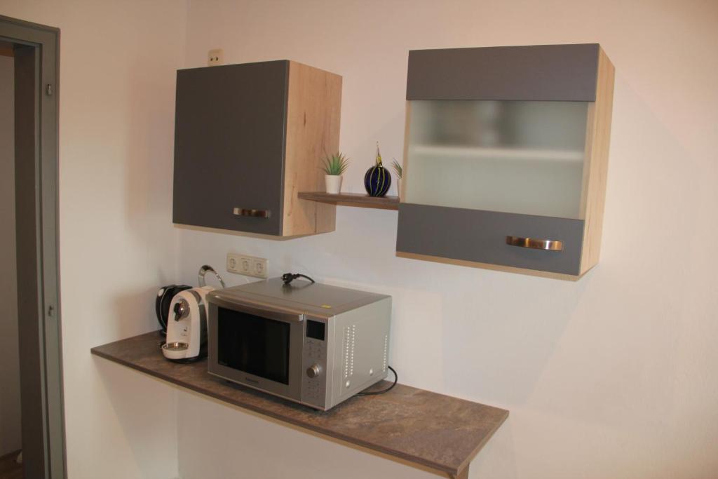Kuchyň nebo kuchyňský kout v ubytování Hotel Apartment Das Au- Gut