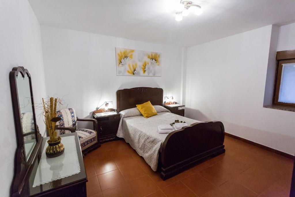 Postel nebo postele na pokoji v ubytování CASA SEGADE