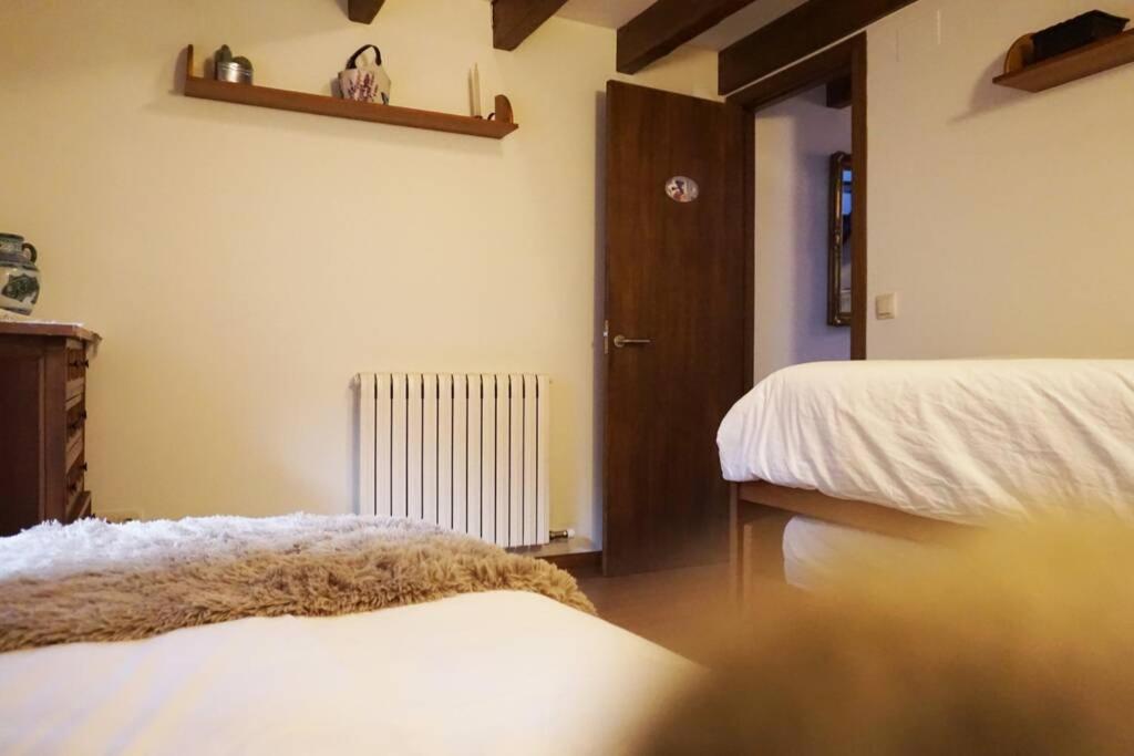 Postel nebo postele na pokoji v ubytování CAN REXACH