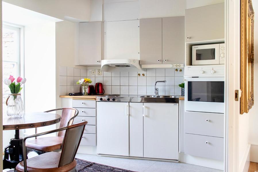 Majoituspaikan Visby City Apartments S:t Hansgatan keittiö tai keittotila