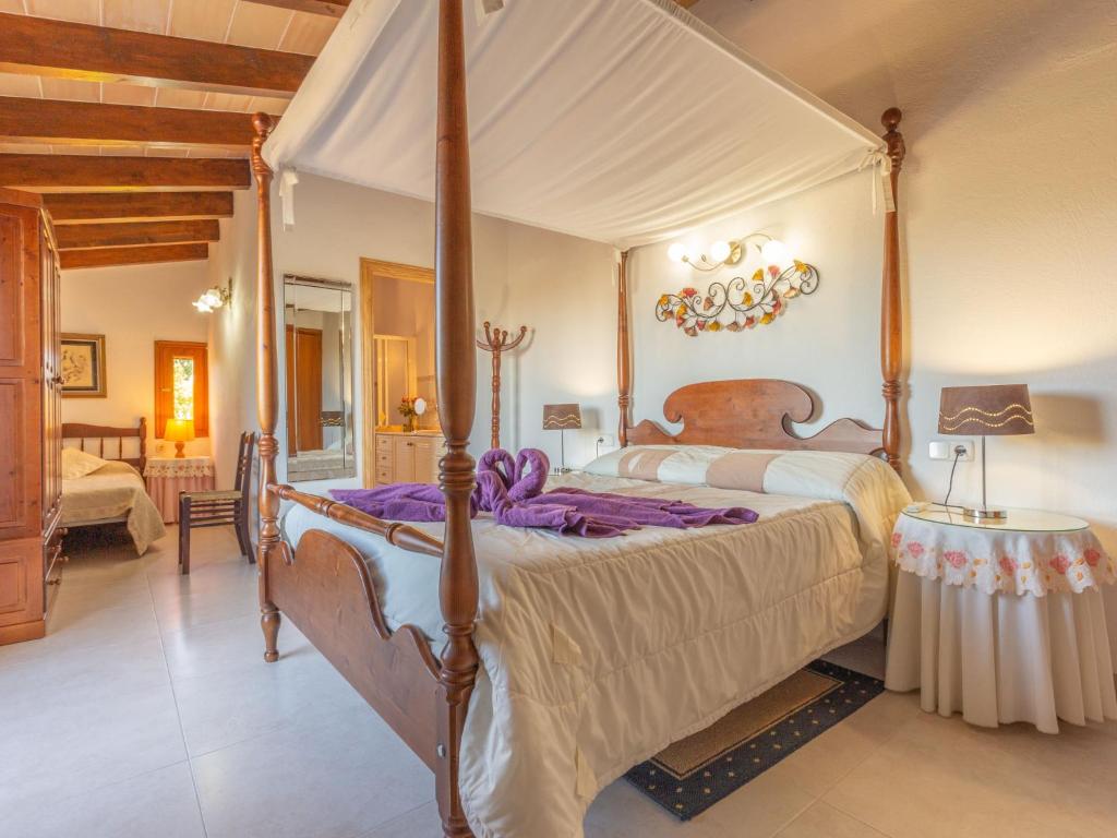 Postel nebo postele na pokoji v ubytování Holiday Home Ca Na Guerrera by Interhome
