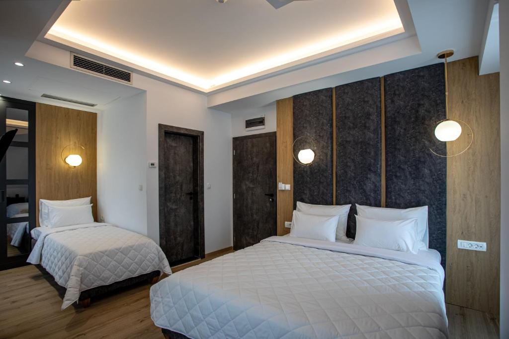 Postel nebo postele na pokoji v ubytování Grand Central Hotel