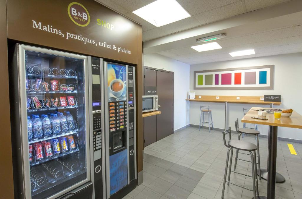 Kuchyň nebo kuchyňský kout v ubytování B&B HOTEL PERPIGNAN Nord Aéroport