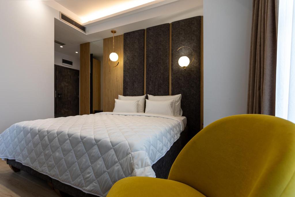 Postel nebo postele na pokoji v ubytování Grand Central Hotel