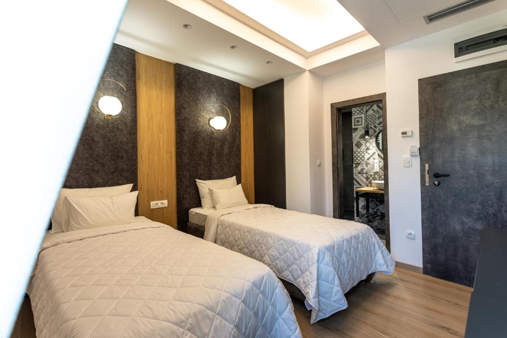 Postel nebo postele na pokoji v ubytování Grand Central Hotel