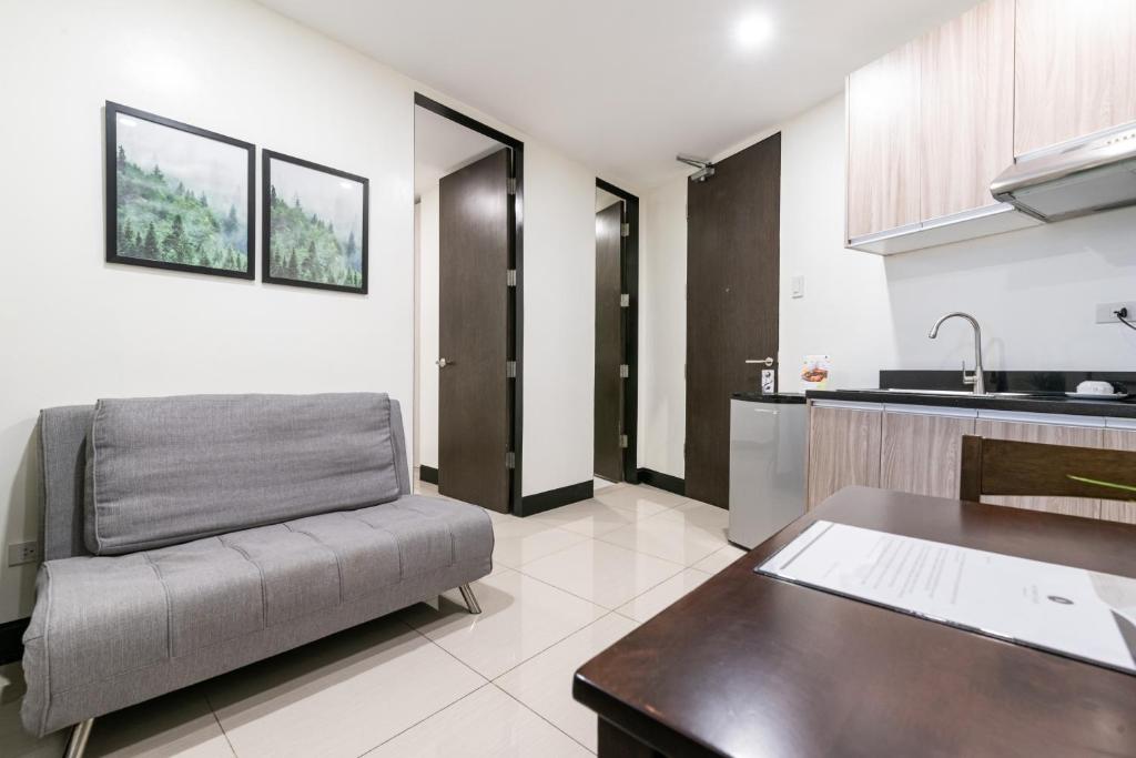 Kuchyň nebo kuchyňský kout v ubytování Artemis Place Makati Hotel