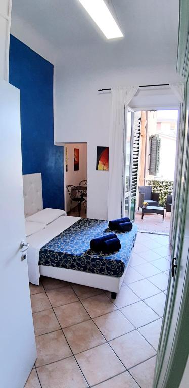A bed or beds in a room at B&B La Cittadella