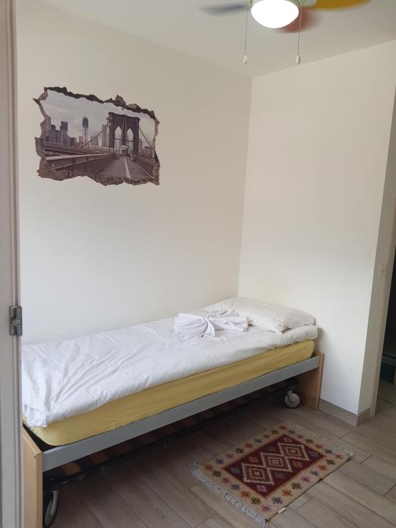 Postel nebo postele na pokoji v ubytování Bellinzona Rooms
