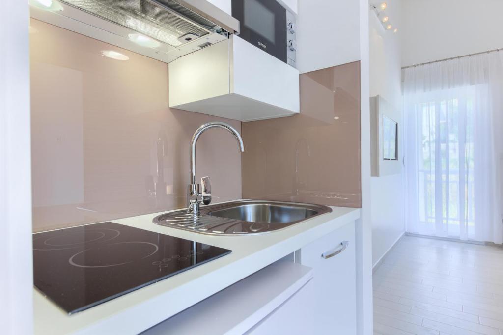 Kuchyň nebo kuchyňský kout v ubytování Stipe Residence