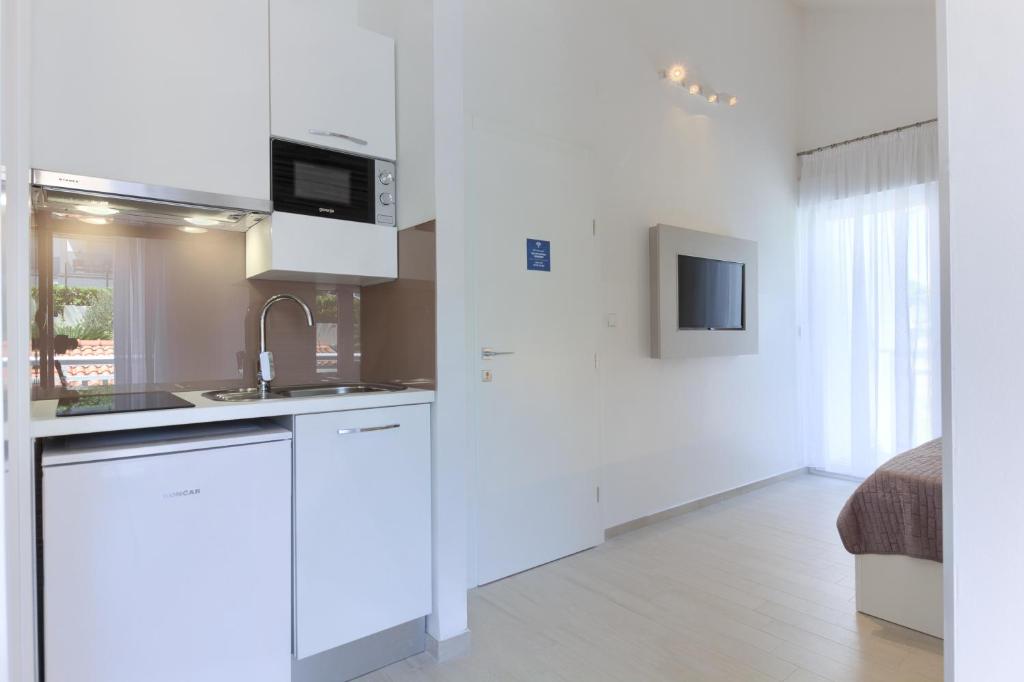 Kuchyň nebo kuchyňský kout v ubytování Stipe Residence