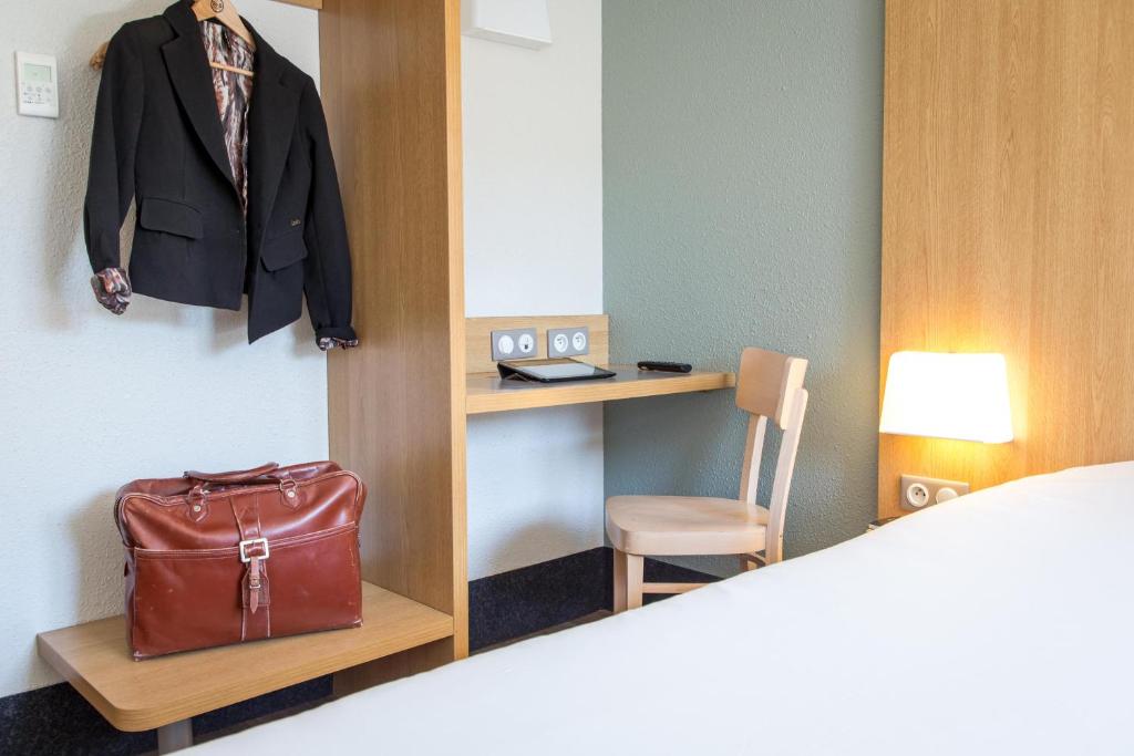 Postel nebo postele na pokoji v ubytování B&B HOTEL PERPIGNAN Nord Aéroport