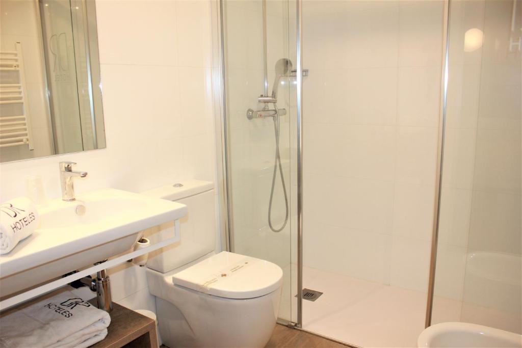 Koupelna v ubytování Hotel Dos Rios Central