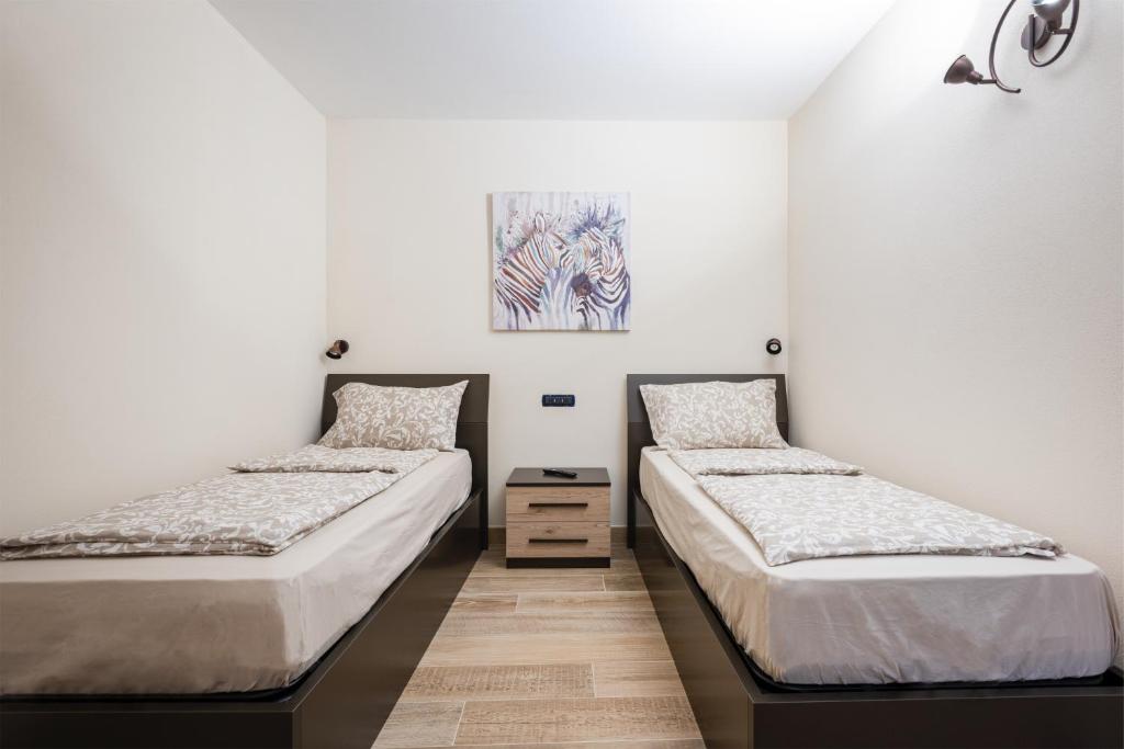 Posteľ alebo postele v izbe v ubytovaní CASA MARTINELLI