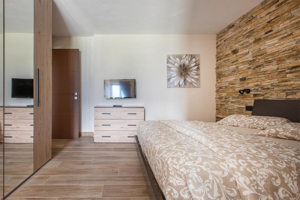 Posteľ alebo postele v izbe v ubytovaní CASA MARTINELLI