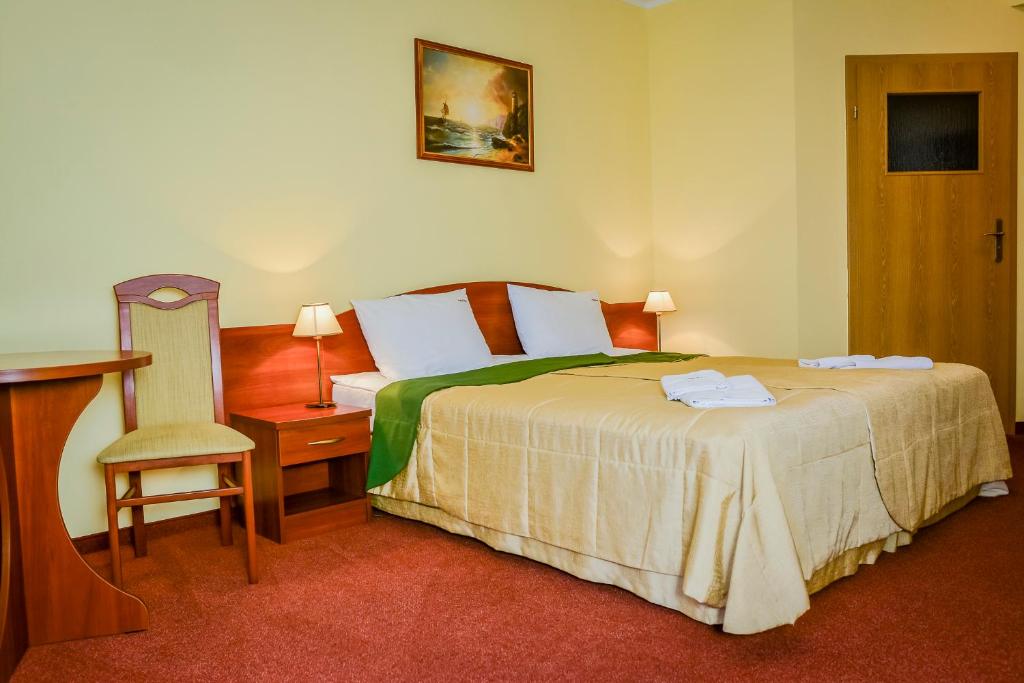 Łóżko lub łóżka w pokoju w obiekcie Villa Sylvia