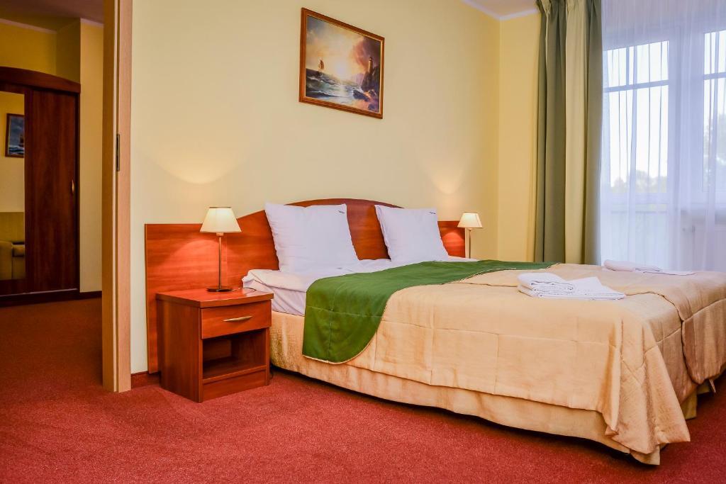 Łóżko lub łóżka w pokoju w obiekcie Villa Sylvia