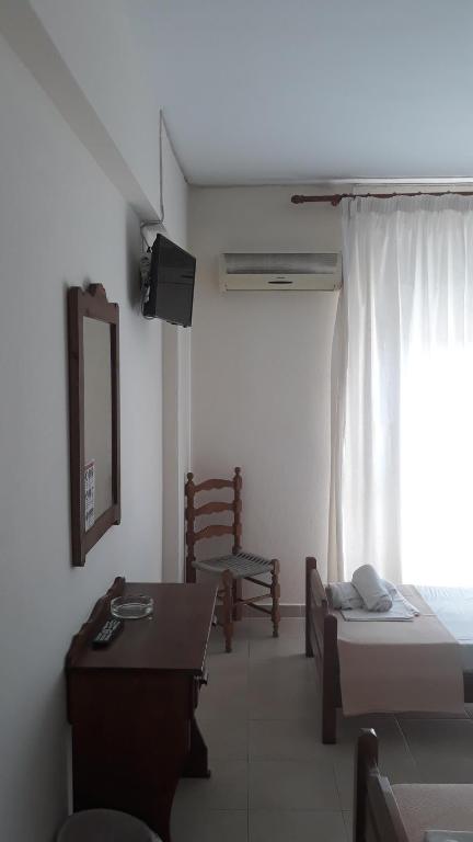 TV a/nebo společenská místnost v ubytování Hotel Lena