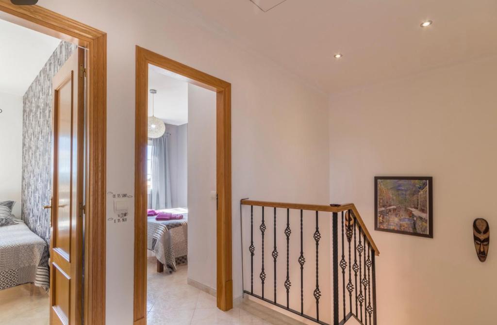 Postel nebo postele na pokoji v ubytování Villa Las Bahías