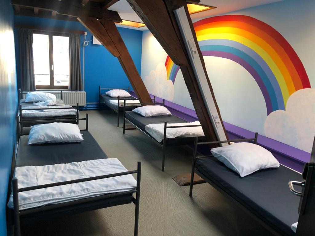 Voodi või voodid majutusasutuse Antwerp City Hostel toas