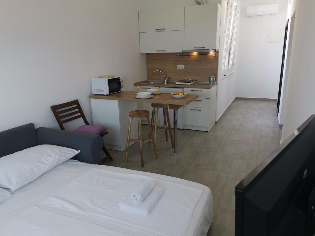 Kuchyň nebo kuchyňský kout v ubytování Apartments ZINA