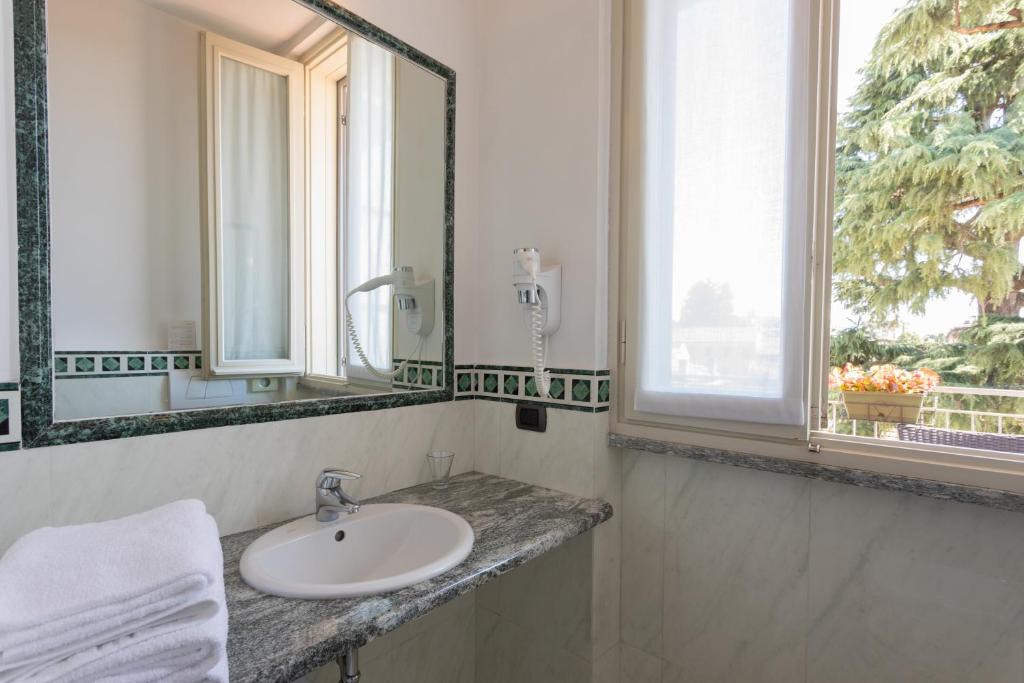 Koupelna v ubytování Hotel Dei Tigli