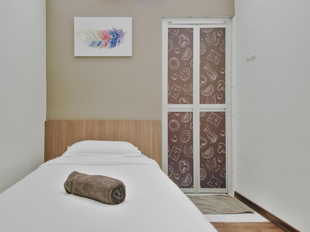 Postel nebo postele na pokoji v ubytování Hotel Eco Desaru