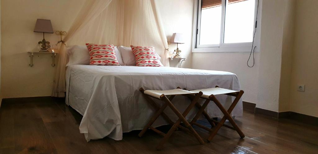 Postel nebo postele na pokoji v ubytování Les Llambrich - Apartamentos turísticos