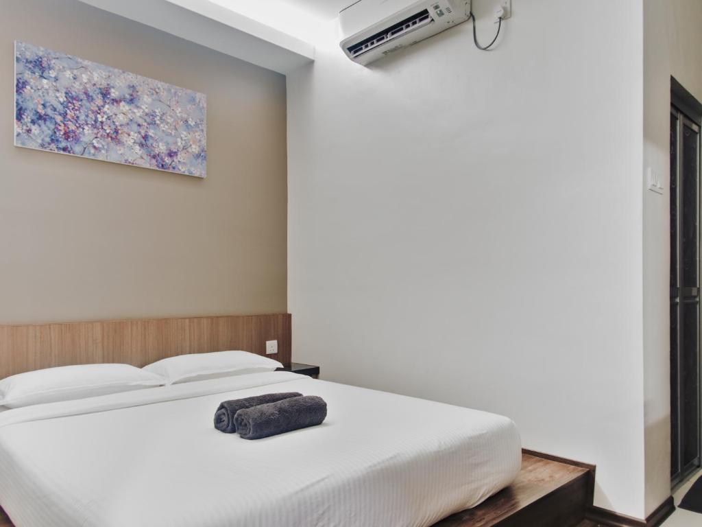Postel nebo postele na pokoji v ubytování Hotel Eco Desaru