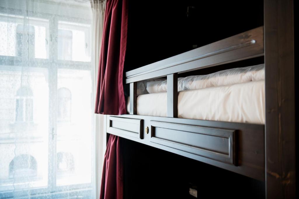 Postel nebo postele na pokoji v ubytování Vienna Boutique - Premium Hostel