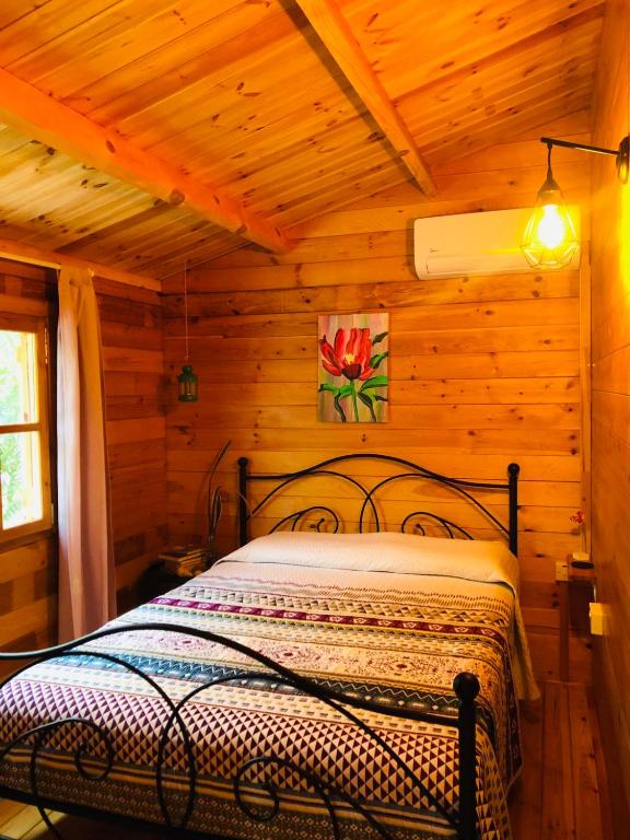 Postel nebo postele na pokoji v ubytování Happy Glamping Cy