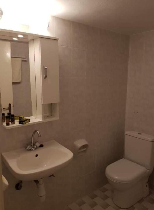Ванная комната в Arginonta Beach Apartments