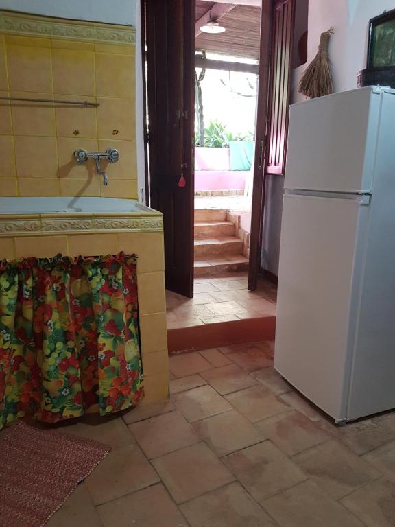 Kuchyňa alebo kuchynka v ubytovaní dammuso bianco