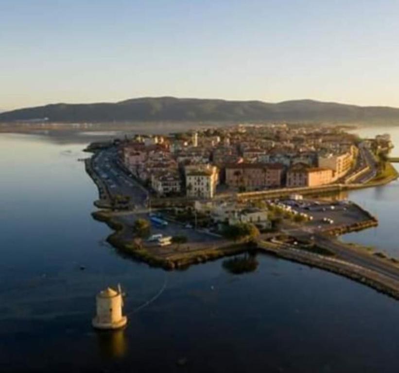 an aerial view of a city in the water at Affittacamere orbetello centro in Orbetello