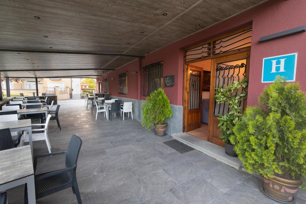 Un restaurante o sitio para comer en Hotel Cinca