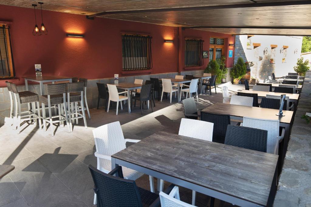 Un restaurante o sitio para comer en Hotel Cinca