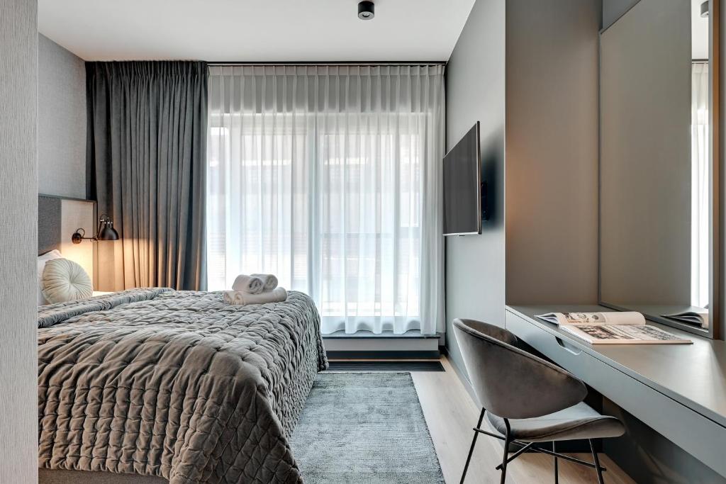 Posteľ alebo postele v izbe v ubytovaní Deo Plaza Luxury Apartments by Blue Mandarin